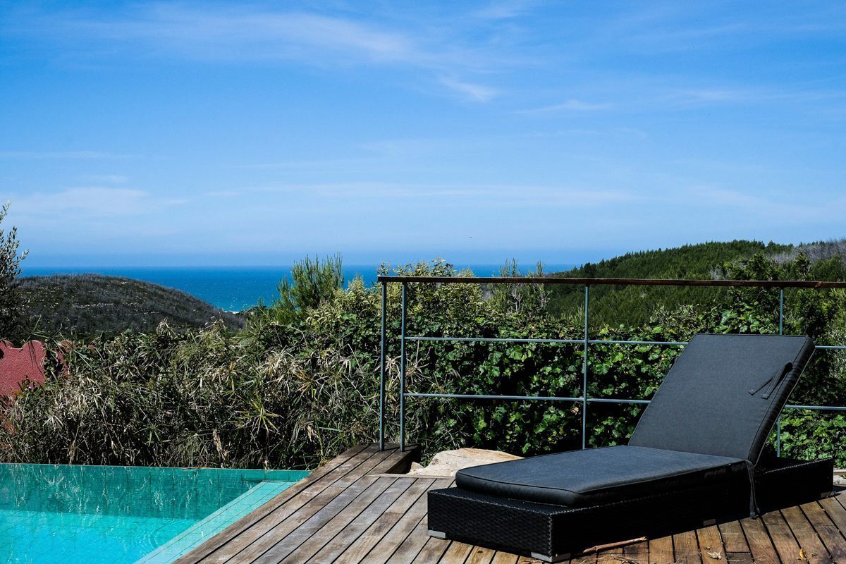 Infinity-Pool, beheizter Pool, Liegestühle