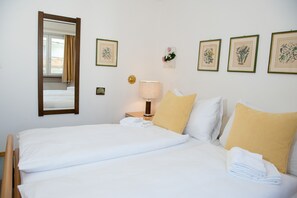 2 عدّة غرف نوم وواي فاي مجانًا وملاءات أسرّة