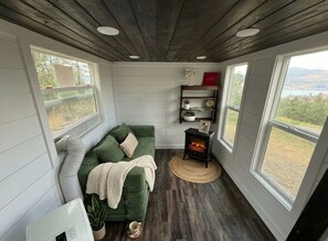 Living area - Sunset Lake Retreat: Tiny Home, Lawn Games, RV & Boat Parking (davenport)