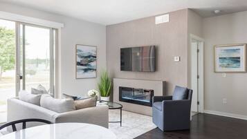 Smart TV, fireplace, books, offices