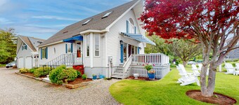 Charming home with ocean view, firepit, deck, golf nearby, & W/D