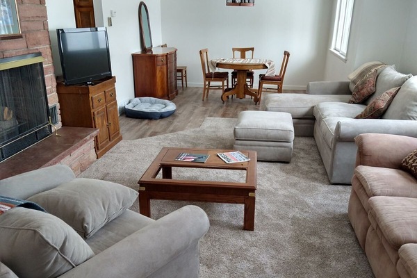 The spacious living room is great for relaxing and catching up.