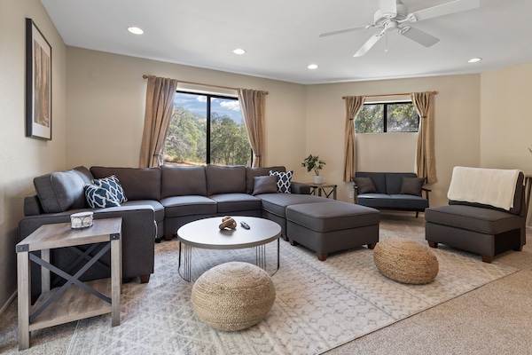 After a long day of exploring & hiking, watch 70" 4K TV under AC & ceiling fan