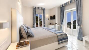 Appartamento Deluxe | 1 camera, minibar, una cassaforte in camera, una scrivania