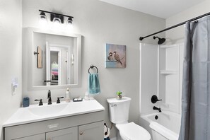 Hair dryer, towels, soap, shampoo