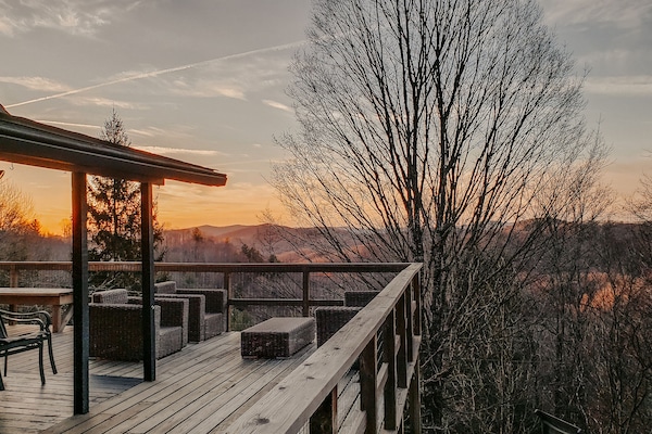 Enjoy scenic views from your expansive deck--fully equipped w/ outdoor seating
