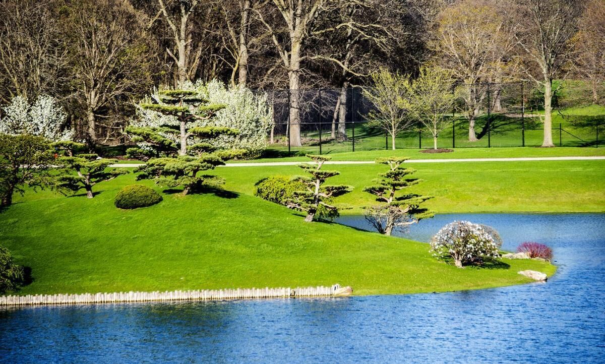 Breathe in fresh air beside calm water and manicured lawns.