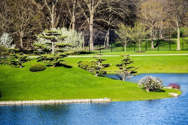 Breathe in fresh air beside calm water and manicured lawns.