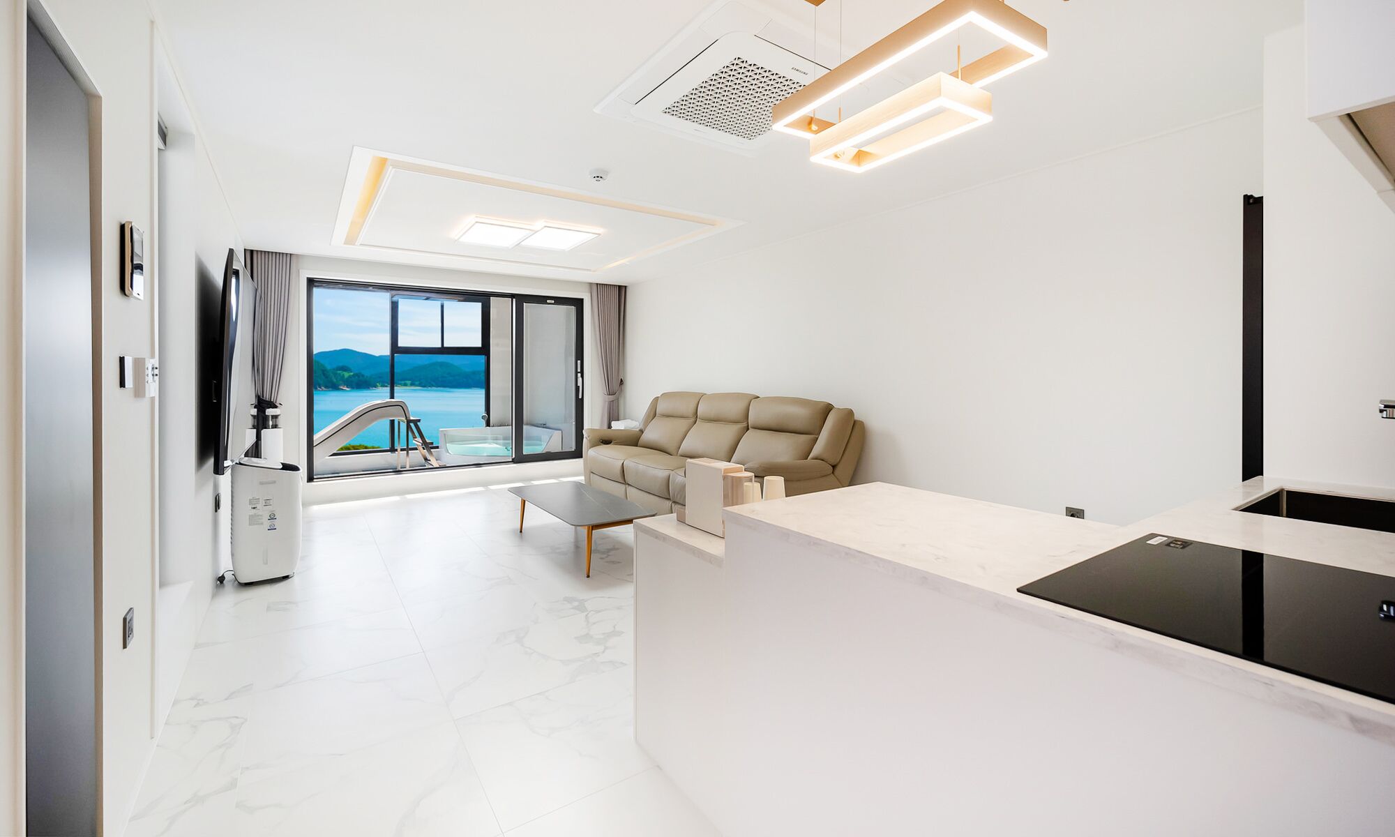 A01 Pool Villa | Living area | 86-inch Smart TV with digital channels, heated floors