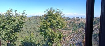 top of the mountain surrounding with nature view and snow caped mountains view f