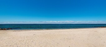 Water-view home in great location with spacious backyard, grill, kayaks, dogs OK