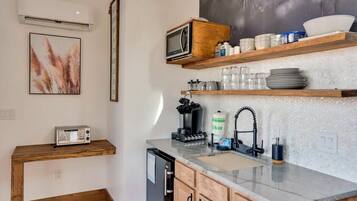 Fridge, microwave, coffee/tea maker, toaster