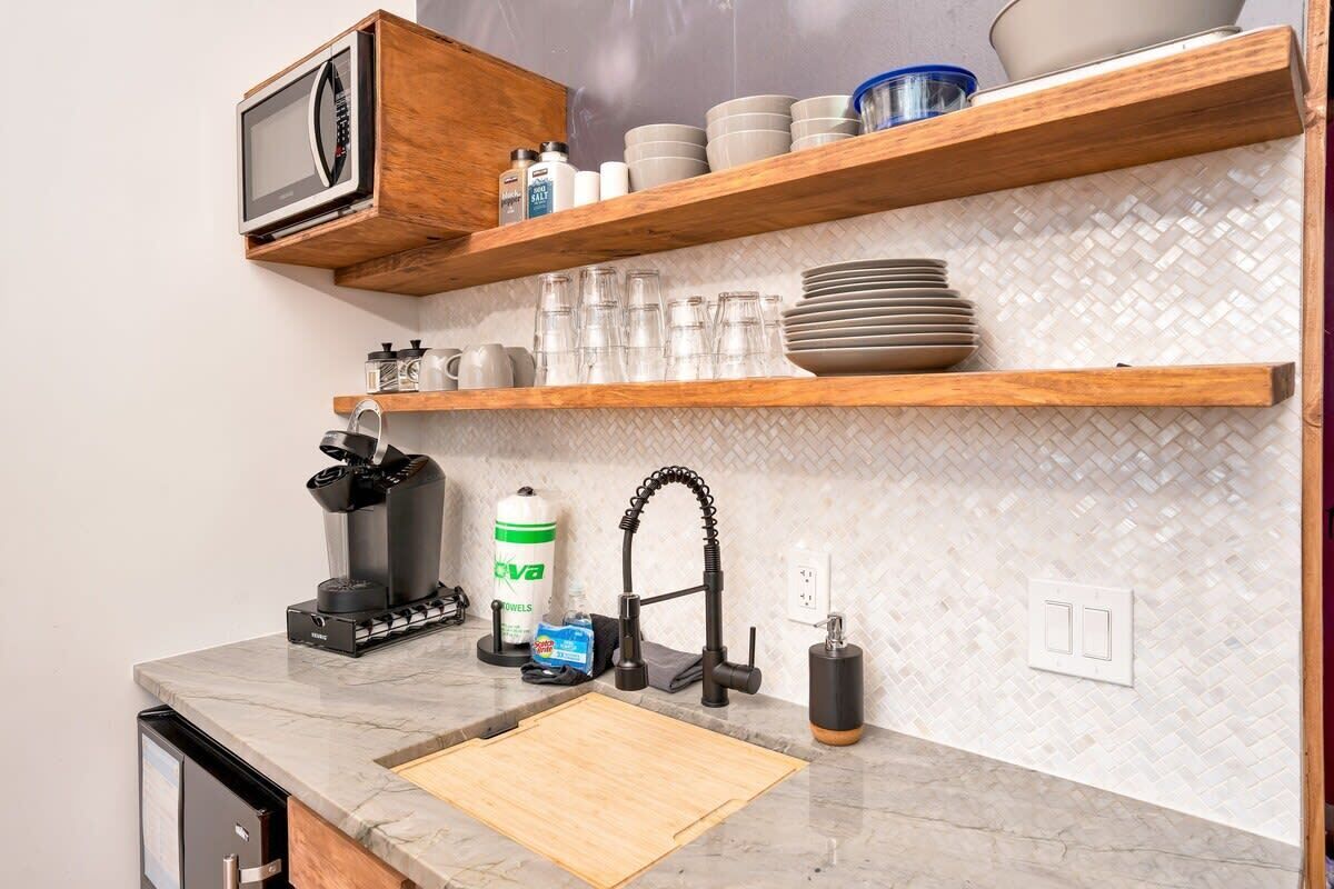 Fridge, microwave, coffee/tea maker, toaster