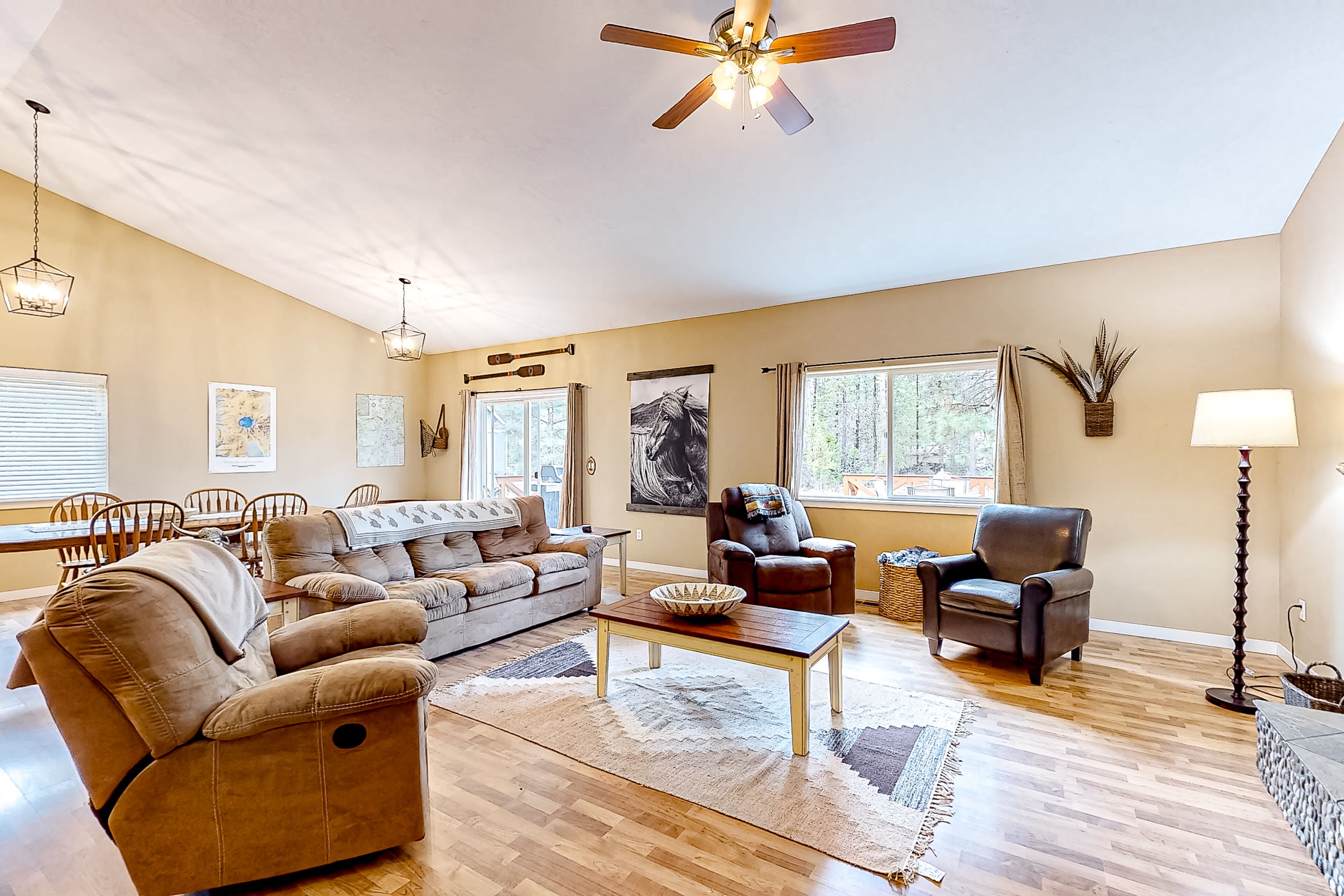 Dog-friendly home with fenced yard, deck, grill, fireplace, & great location