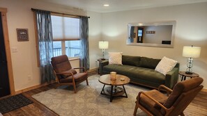 Deluxe Apartment, 2 Bedrooms, Mountain View, Mountainside | Living area | 35-inch Smart TV with cable channels, TV - Beargrass Lodging and RV Resort (Hungry Horse)