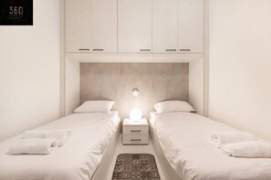 2 bedrooms, desk, iron/ironing board, travel cot