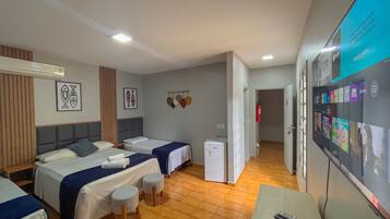 Basic Quadruple Room | Minibar, WiFi (free), bed sheets