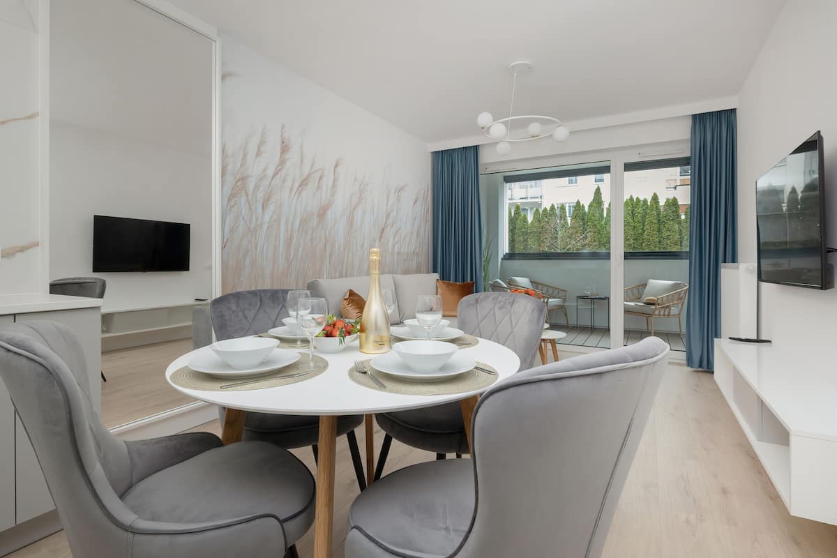 Appartamento Exclusive | Area soggiorno | TV LED 50 pollici con canali satellitari, TV