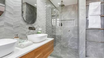 Shower, hair dryer, towels, soap