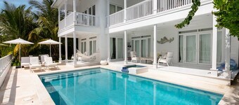 Serene waterfront house w pool, dock & beautiful sunsets - 5 min walk to beach.