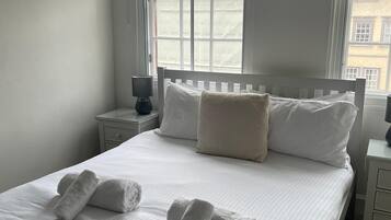 2 dormitorios, tabla de planchar con plancha, wifi gratis y ropa de cama