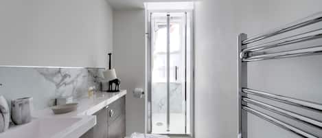 Shower, towels, soap, shampoo