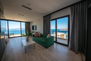 Deluxe Suite, Terrace, Sea View | Premium bedding, in-room safe, desk, blackout drapes