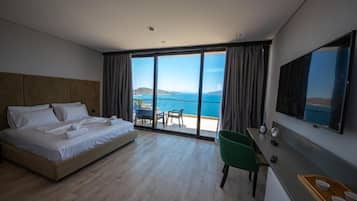 Suite Deluxe, Terraza, vista al mar | 1 habitación y ropa de cama de alta calidad