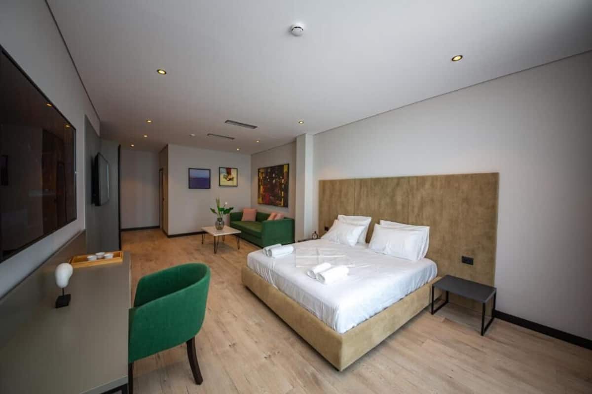 Deluxe Suite, Balcony, Sea View | 1 bedroom, premium bedding, in-room safe, desk