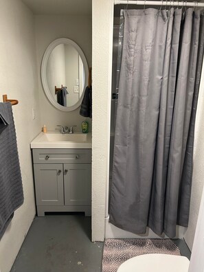 Shower, towels, soap, shampoo