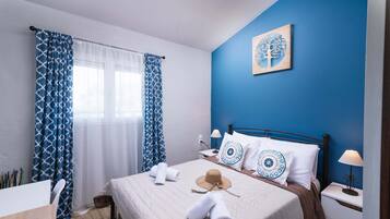 Design House, 2 Bedrooms, Balcony, Ocean View | 2 bedrooms, desk, laptop workspace, free WiFi