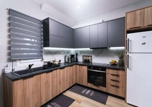 Design House, 2 Bedrooms, Balcony, Ocean View | Private kitchen | Full-size fridge, oven, dishwasher, espresso maker