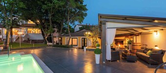 Casa vacacional con un jardín grande y piscina