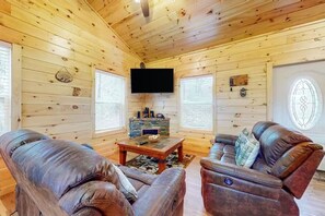 Smart TV, fireplace, foosball, music library