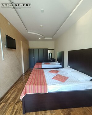 Standard Triple Room | Down duvets, minibar, in-room safe, desk