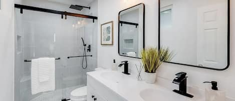 Shower, hair dryer, towels, soap