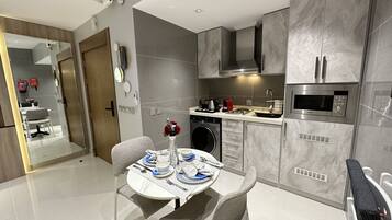 Full-size fridge, microwave, espresso maker, coffee/tea maker