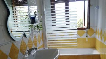 Jetted bath, hair dryer, towels, soap
