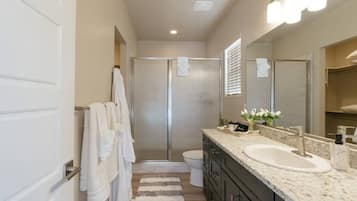 Bathtub, hair dryer, towels, soap