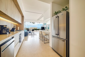 Deluxe Apartment, Terrace, Corner | Private kitchen | Fridge, microwave, oven, dishwasher - Maxwell Collection Romantic Zone (Puerto Vallarta)
