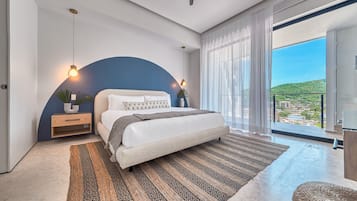 Apartament Deluxe, 1 dormitori, vistes parcials a l'oceà | 1 dormitori, roba de llit d'alta qualitat i caixa forta a l'habitació