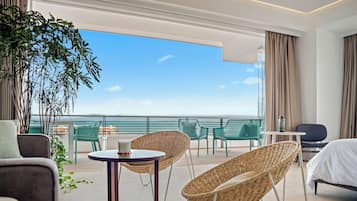 Apartamento, 1 quarto, vista para o oceano, no canto | Área de estar | Smart TV 50 polegadas com canais digitais, TV