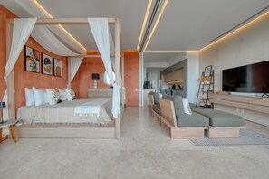 Deluxe Apartment, Terrace, Partial Ocean View | Living area | 50-inch Smart TV with digital channels, TV - Maxwell Collection Romantic Zone (Puerto Vallarta)