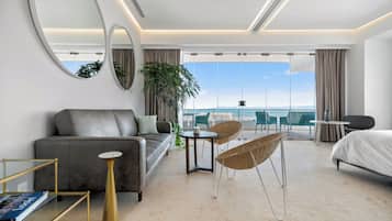 Apartamento, 1 quarto, vista para o oceano, no canto | Área de estar | Smart TV 50 polegadas com canais digitais, TV