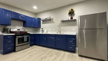 Microwave, oven, stovetop, dining tables
