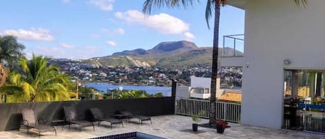 Outdoor pool, open 9:00 AM to 6:00 PM, sun loungers