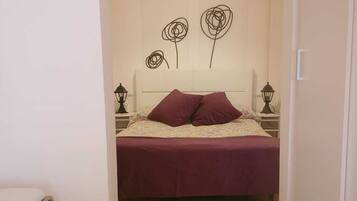 1 dormitori i roba de llit