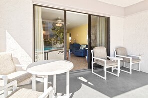 Terrace/patio - Beautiful ground floor condo. Steps to the heated pool, BBQ grills, and beach! ☀️ (Cocoa Beach)