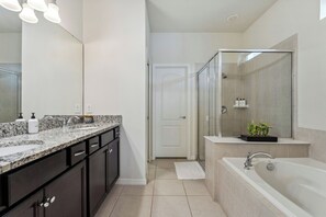Shower, eco-friendly toiletries, hair dryer, towels