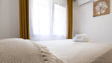 2 slaapkamers, een strijkplank/strijkijzer, gratis wifi, beddengoed